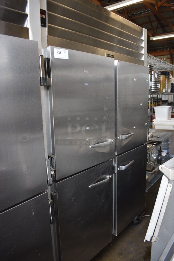 Traulsen Model G20000MC Stainless Steel Commercial 4 Half Size Door Reach In Cooler w/ Poly Coated Racks on Commercial Casters. 115 Volts, 1 Phase. 52x35x83.5. Tested and Working!