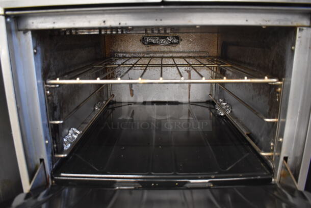 Garland SunFire X24-4L Stainless Steel Commercial Natural Gas Powered 4 Burner Range w/ Oven, Over Shelf and Back Splash. 23.5x35x57 - Image 6 of 8
