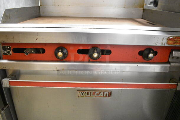 Vulcan 36XTL-559 Stainless Steel Commercial Propane Gas Powered Flat Top Griddle w/ Oven, Over Shelf and Back Splash on Commercial Casters. - Image 4 of 7