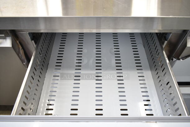 BRAND NEW SCRATCH AND DENT! 2023 Avantco 178SSUD3R Stainless Steel Commercial Undercounter Cooler w/ Door and 4 Drawers on Commercial Casters. 115 Volts, 1 Phase. Tested and Powers On But Does Not Get Cold - Image 5 of 11