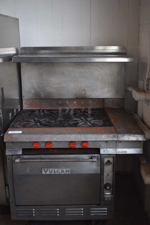 Vulcan Stainless Steel Commercial Natural Gas Powered 4 Burner Range w/ Oven, Over Shelf and Back Splash on Commercial Casters. 43.5x40x61 - Image 1 of 11