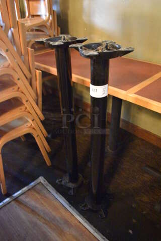 2 Black Metal Bar Height Table Bases. BUYER MUST REMOVE. 10x10x40. 2 Times Your Bid! (Susquehanna Ale House)