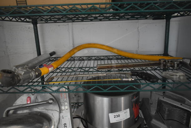 ALL ONE MONEY! Tier Lot of Various Items Including Gas Hose and Can Opener - Image 1 of 5