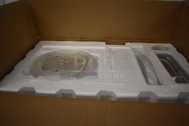 BRAND NEW SCRATCH AND DENT! Frigidaire FMOS1846BW White Over Range Microwave Oven. Stock Picture Used For Gallery Picture. - Image 4 of 4