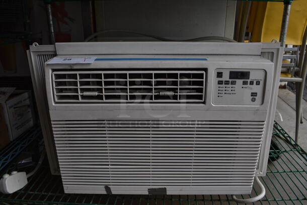 General Electric Model AHM10AWQ1 Window Mount Air Conditioning Unit. 115 Volts, 1 Phase. 26x22x16. Tested and Working!