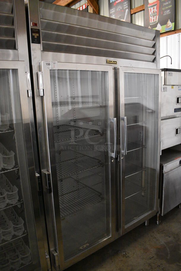 Traulsen AHT232NUT-FHG Stainless Steel Commercial 2 Door Reach In Cooler Merchandiser w/ Metal Racks. 115 Volts, 1 Phase. 52x36x83.5. Tested and Powers On But Does Not Get Cold