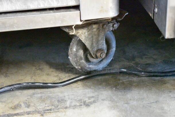 2017 Atosa MBF8505 Stainless Steel Commercial Single Door Reach In Cooler w/ Poly Coated Racks on Commercial Casters. 115 Volts, 1 Phase. Tested and Powers On But Does Not Get Cold - Image 2 of 4