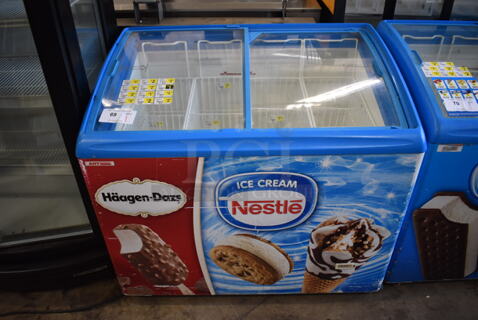 AHT RIO S 100 Metal Commercial Novelty Ice Cream Freezer Merchandiser on Commercial Casters. 110-120 Volts, 1 Phase. 39x25x35. Tested and Working!