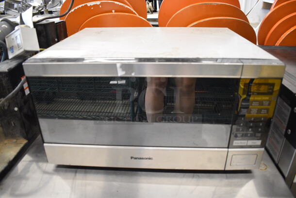 Panasonic Metal Countertop Microwave Oven w/ Plate. 22x18x12