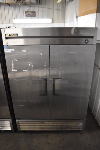 2013 True T-49F ENERGY STAR Stainless Steel Commercial 2 Door Reach In Freezer w/ Poly Coated Racks on Commercial Casters. 115 Volts, 1 Phase. 54x30x83. Tested and Working!