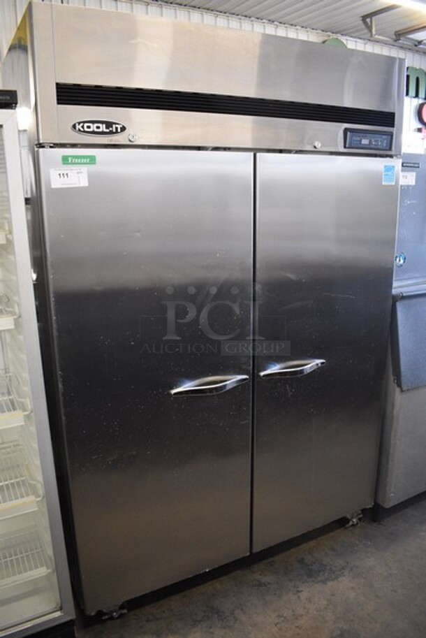 Kool-It Model KTSF-2 Stainless Steel Commercial 2 Door Reach In Freezer w/ Poly Coated Racks on Commercial Casters. 115 Volts, 1 Phase. 54x32.5x81.5. Tested and Working!