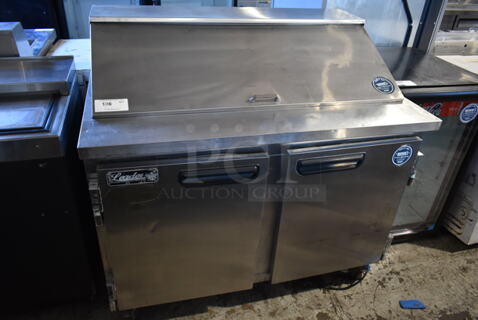 2014 Leader ESLM48S/C Stainless Steel Commercial Sandwich Salad Prep Table Bain Marie Mega Top on Commercial Casters. 115 Volts, 1 Phase. Tested and Powers On But Does Not Get Cold
