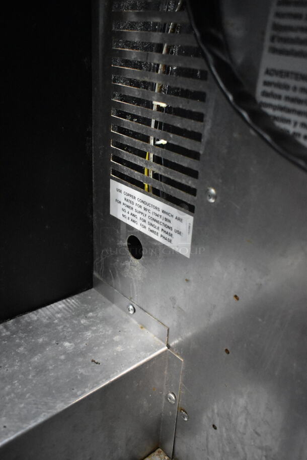 Duke Stainless Steel Commercial Electric Powered Full Size Convection Full Size Convection Oven w/ View Through Doors, Metal Oven Racks, Thermostatic Controls and Metal Legs. 250 Volts, 3 Phase.  - Image 6 of 6