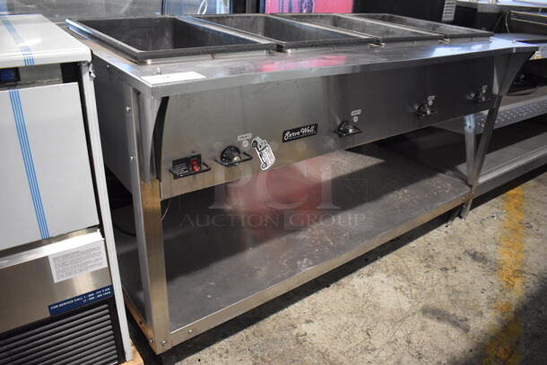 Vollrath 38218 Stainless Steel Commercial Electric Powered 4 Bay Steam Table w/ Under Shelf. 208-240 Volts, 1 Phase. 60.5x29.5x35