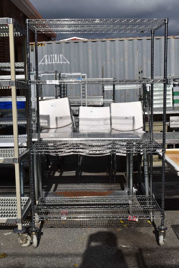 Chrome Finish 4 Tier Wire Shelving Unit on Commercial Casters. BUYER MUST DISMANTLE. PCI CANNOT DISMANTLE FOR SHIPPING. PLEASE CONSIDER FREIGHT CHARGES. 48x24x80 - Image 1 of 5