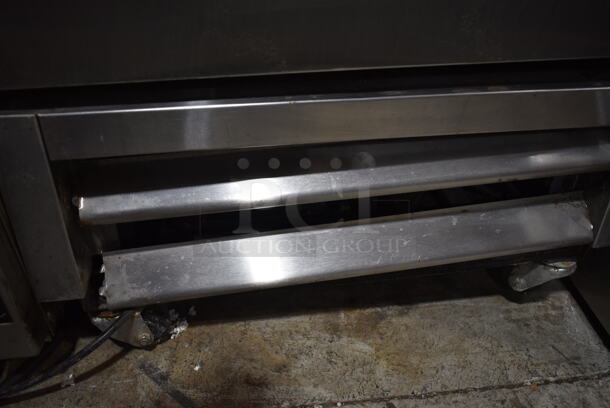 2017 True T-19F Stainless Steel Commercial Single Door Reach In Cooler w/ Poly Coated Racks on Commercial Casters. 1 Caster Needs To Be Reattached. 115 Volts, 1 Phase. Tested and Working! - Image 3 of 7