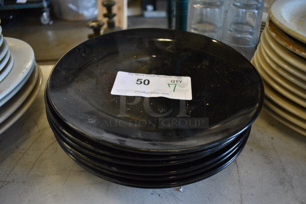 7 Black Ceramic Plates. 10.5x10.5x1. 7 Times Your Bid!