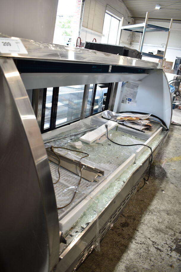 BRAND NEW SCRATCH AND DENT! 2024 Avantco 178DLC82HCS Stainless Steel Commercial Floor Style Curved Glass Refrigerated Deli Case Merchandiser. See Pictures For Broken Glass. 115 Volts, 1 Phase. Cannot Test Due To Cut Power Cord - Image 2 of 6