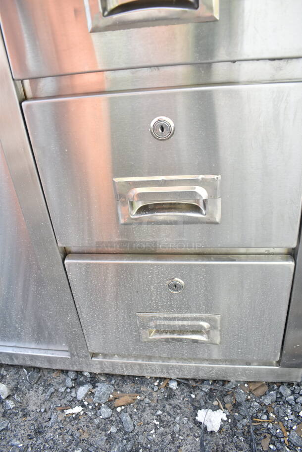 BRAND NEW SCRATCH AND DENT! Regency 600EBT2472R 24" x 72" 16 Gauge Type 304 Stainless Steel Enclosed Base Sliding Door Table with Drawers - Image 4 of 6