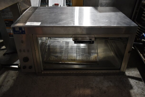 Esquire R2-3 Stainless Steel Commercial Countertop Electric Powered Rotisserie Oven. 220 Volts, 1 Phase.