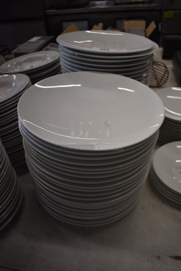 22 White Ceramic Plates. 11.5x11.5x1. 22 Times Your Bid!