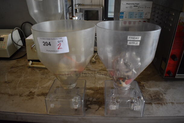2 Poly Pastry Donut Filler Hoppers. Goes GREAT w/ Lots 205-207! 9x10x13. 2 Times Your Bid!