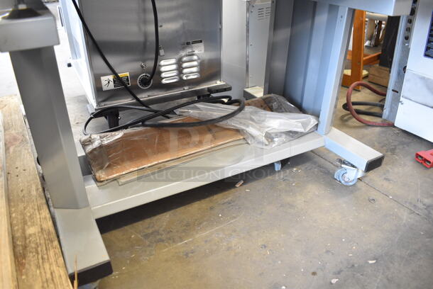 Italdibipack Dibipack 4255 EV Evolution Metal Commercial Floor Style Wrapping Station on Commercial Casters. 220 Volts.  - Image 6 of 9