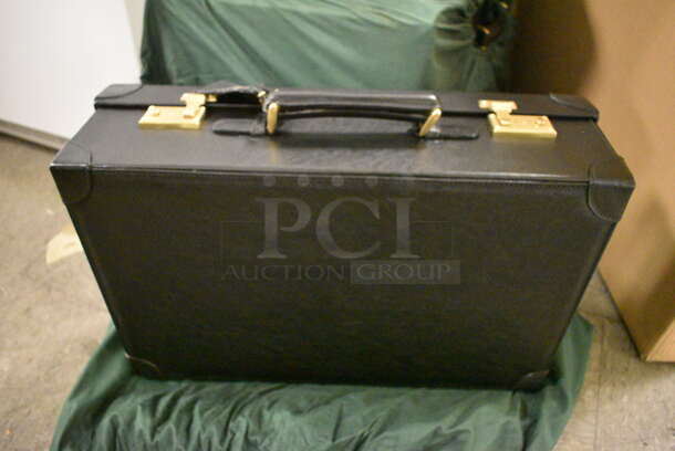 4 Black Leather Briefcases with Protective Covers and Combination Pad. 4 Times Your Bid!