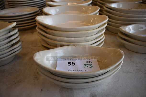 33 White Ceramic Single Serving Casserole Dishes. 8.5x4.5x1.5. 33 Times Your Bid!