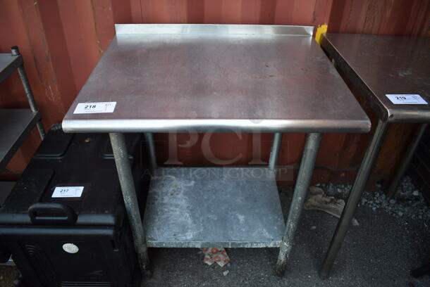 Stainless Steel Table w/ Metal Under Shelf and Back Splash. 30x24x37