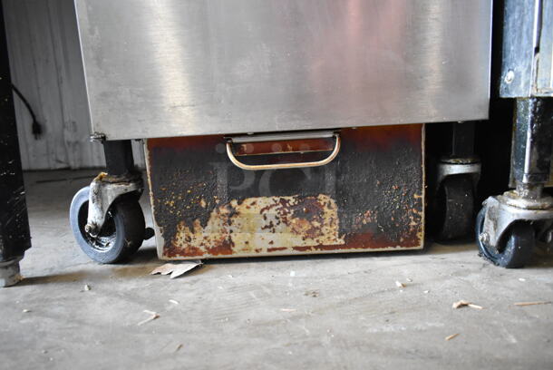 Henny Penny OEA-F Stainless Steel Commercial Floor Style Electric Powered Deep Fat Fryer w/ 2 Metal Fry Baskets on Commercial Casters. 208 Volts, 3 Phase.  - Image 4 of 6