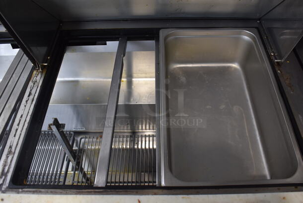 2015 Model True TSSU-60-24M-B-ST Commercial Stainless Steel Sandwich/Salad Prep Table With Overhead Shelving, Steel Pans And Refrigerated Base With Steel Racks. 115V/1 Phase. Tested And Working - Image 4 of 7