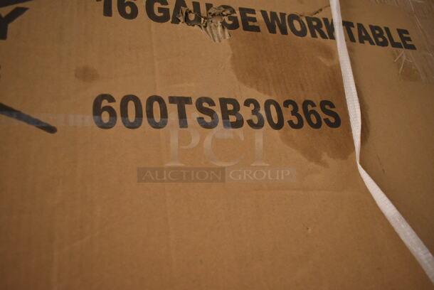 BRAND NEW SCRATCH AND DENT! Regency 600TSB3036S 30" x 36" 16-Gauge Stainless Steel Commercial Work Table with 4" Backsplash and Undershelf - Image 2 of 2