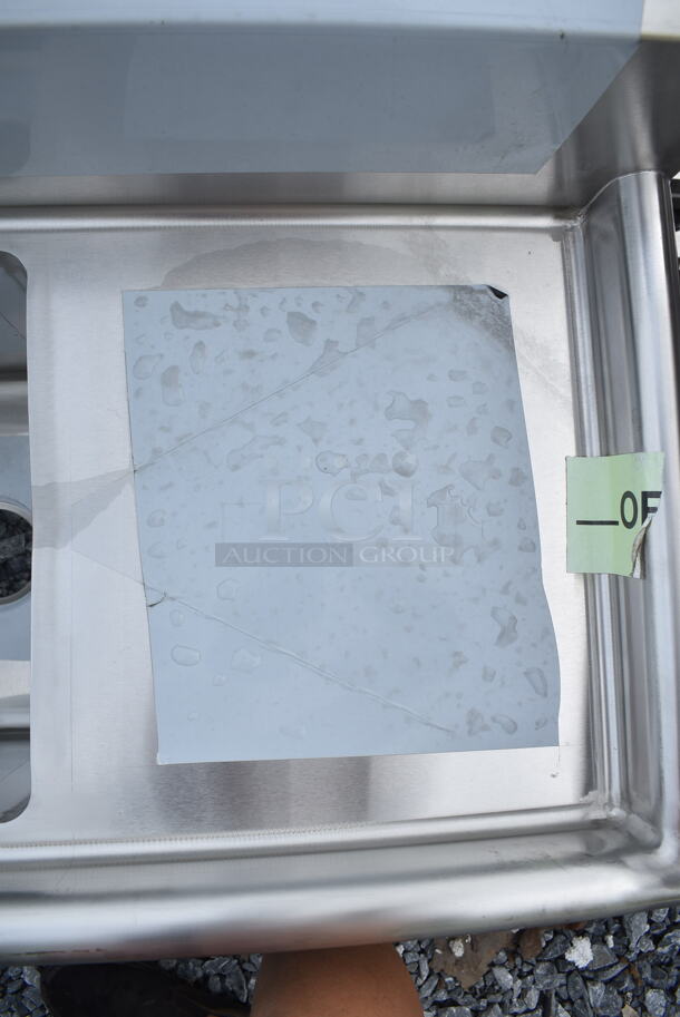 BRAND NEW SCRATCH AND DENT! Regency 600S21014216 54" 16-Gauge Stainless Steel Two Compartment Commercial Sink with Galvanized Steel Legs and Two Drainboards - 10" x 14" x 12" Bowls. No Legs.  - Image 5 of 9