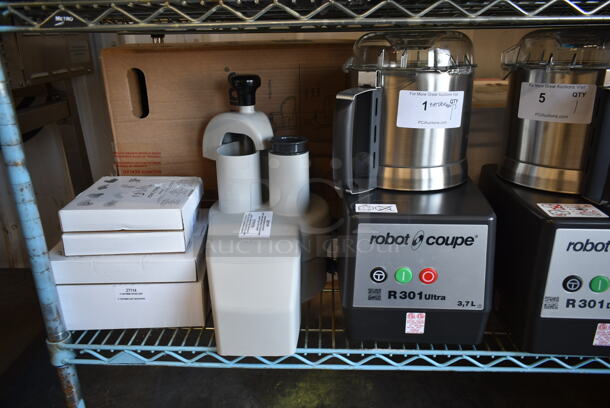 BRAND NEW SCRATCH AND DENT! Robot Coupe R 301 U Series D Stainless Steel Commercial Countertop Food Processor w/ Bowl, Lid, Continuous Feed Head, Grater Blade, Slicer Blade, S Blade and D Clean Kit. 120 Volts, 1 Phase. Tested and Working! - Image 1 of 12
