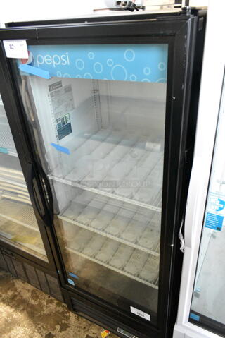 2024 True GDM-12-HC Metal Commercial Single Door Reach In Cooler Merchandiser w/ Poly Coated Racks. 115 Volts, 1 Phase. Tested and Working!