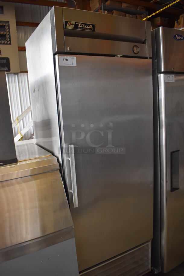 True T-23 Stainless Steel Commercial Single Door Reach In Cooler w/ Poly Coated Racks on Commercial Casters. 115 Volts, 1 Phase. 27x31x83. Tested and Working!