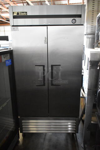2015 True T-35 Stainless Steel Commercial 2 Door Reach In Cooler w/ Poly Coated Racks on Commercial Casters. 115 Volts, 1 Phase. Tested and Working!