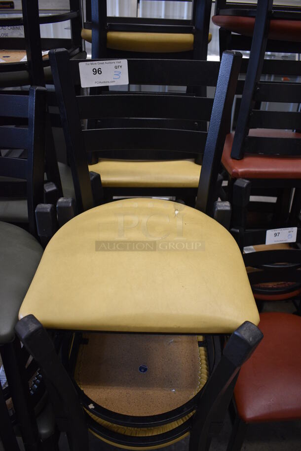 3 Black Metal Dining Height Chairs w/ Yellow Seat Cushions. Stock Picture - Cosmetic Condition May Vary. 17x16x32. 3 Times Your Bid! - Image 1 of 3