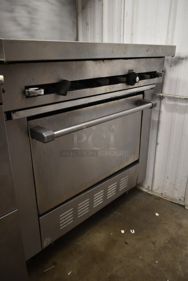 Garland SunFire SX-6-26 Stainless Steel Commercial Natural Gas Powered 6 Burner Range w/ Oven, Over Shelf and Back Splash.  - Image 4 of 7