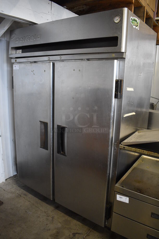 Delfield Model MRR2-S Stainless Steel Commercial 2 Door Reach In Cooler w/ Poly Coated Racks on Commercial Casters. 115 Volts, 1 Phase. 56x34x79. Tested and Powers On But Temps at 51 Degrees - Image 2 of 6