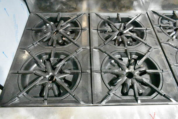 Garland M44R Stainless Steel Commercial Floor Style Natural Gas Powered 4 Burner Range w/ Oven, Over Shelf and Back Splash on Commercial Casters.  - Image 2 of 7