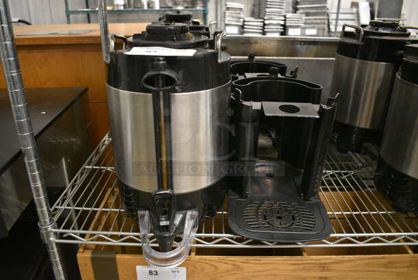 2 Stainless Steel and Black Poly Beverage Holder Dispenser and 2 Black Poly Stands w/ Drip Trays. 9x12x14, 9x13x10. 2 Times Your Bid! - Image 1 of 6