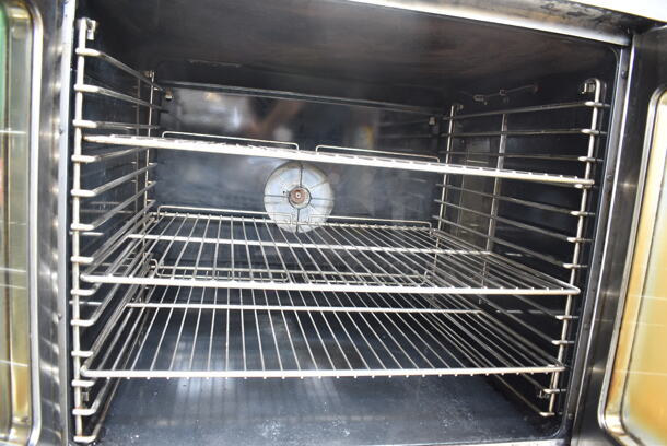 Duke Stainless Steel Commercial Natural Gas Powered Full Size Convection Oven w/ View Through Doors, Metal Oven Racks and Thermostatic Controls.  - Image 4 of 5