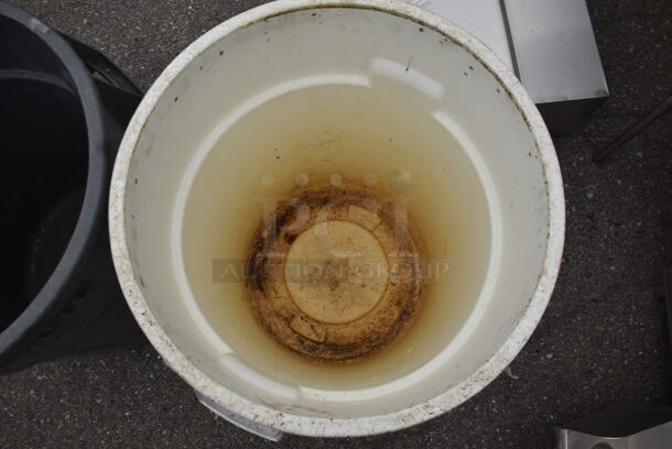 2 Brute Garbage Cans in Gray and White With a Stack of Lids. 2 Times Your Bid!  - Image 3 of 5