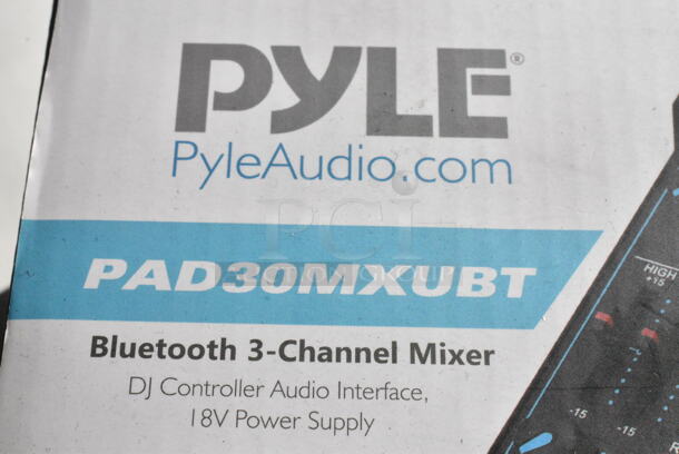7 Various Items Including PLMRKT38W Pyle Marine Radio Receiver Speaker Set 12v Single Din Style Bluetooth Waterproof Digital Boat, PAD30MXUBT Pyle 3-Channel Bluetooth Mixer, PLMRMBT5B 2 Channel Bluetooth Marine Amplifier Kit, PKVS18SL NutriChef Automatic Food Vacuum Sealer, PRJG95 Pyle Multimedia Projector with 1080p Support, NutriChef NCFRYP14 Skillet. 7 Times Your Bid!  - Image 5 of 12