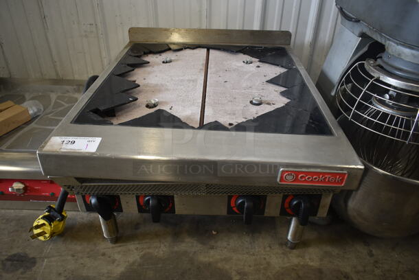 2020 CookTek MC17004-200 Stainless Steel Commercial Countertop Electric Powered 4 Burner Range. 208 Volts. See Pictures For Damaged Range Top.