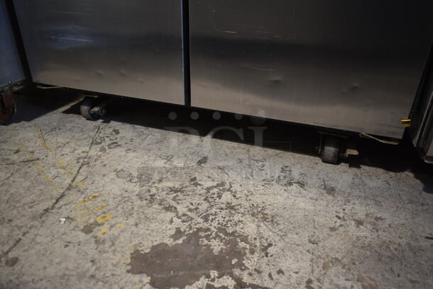 2014 True TG2R-2S ENERGY STAR Stainless Steel Commercial 2 Door Reach In Cooler w/ Poly Coated Racks on Commercial Casters. 115 Volts, 1 Phase. Tested and Working! - Image 4 of 8