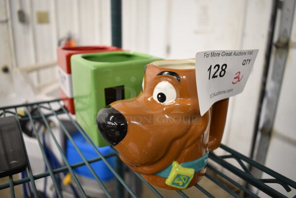 3 Various Ceramic Mugs; Scooby Doo, TNT and Green. Includes 6x4x4.5. 3 Times Your Bid!