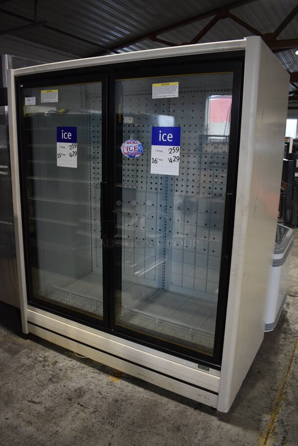 Zero Zone Model RHVZC30IM Metal Commercial 2 Door Reach In Cooler Merchandiser w/ Racks. 115/208-230 Volts, 1 Phase. 66x38x80